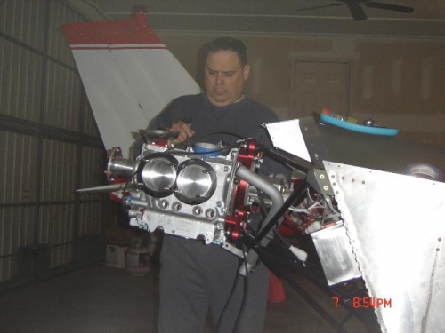 Removing the cylinders to change to 100LL compression.