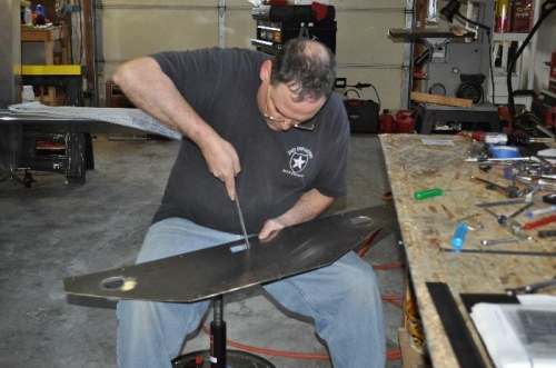 First cuts: vent holes and slip and skid ball.  Lots of hand filing involved.