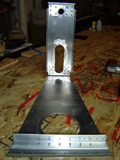 Riveted all of the pieces of the shear web and attach fittings outside of the fuse then slid it inside