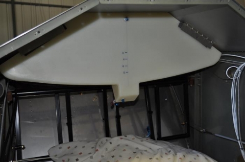 Tank installed under glareshield.