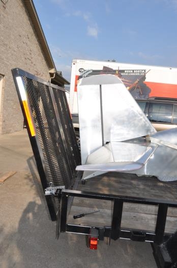 Brackets pinned to gate to provide clearance.