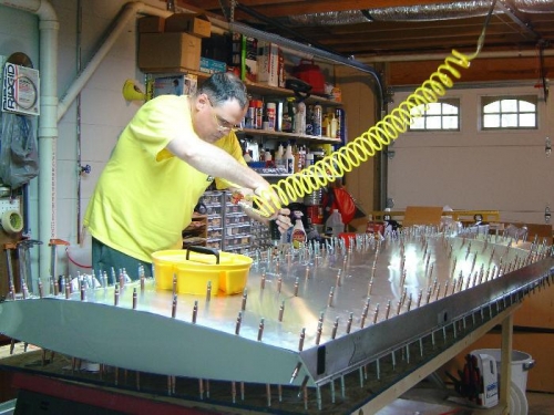 By myself with no help to turn the wing around, so I had to work standing on the spar shipping box.