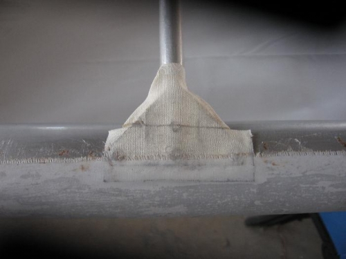 Covered bottom of wing wraped fabric over gussets.