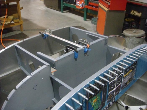 Panel assembly together with channels clamped