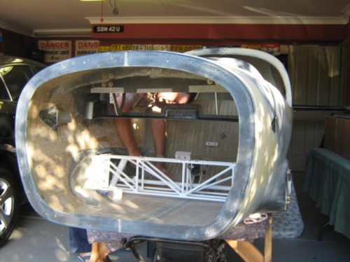 Glassing the seat side rails.