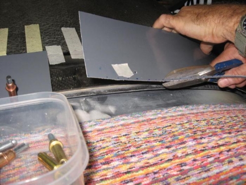 Rough trimming the skins at the front of the canopy.