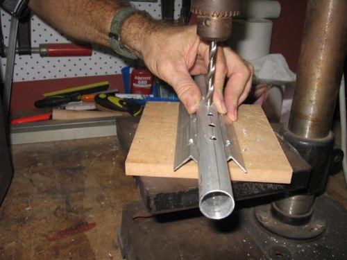 Drilling the fulte tube on patented tube holder.