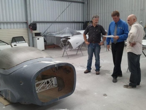 Wayne & Mark discussing paint options with paint shop Pete - engine cowls in the backbround.