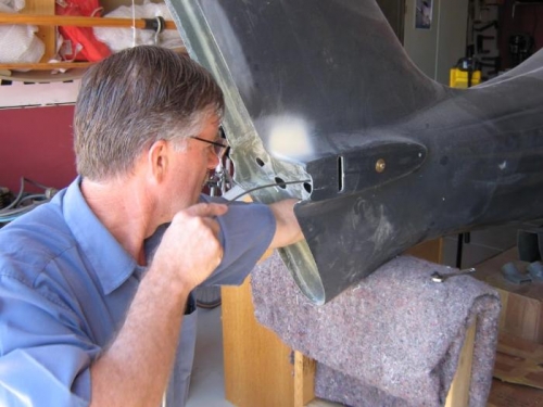 Fitting seat belt cables