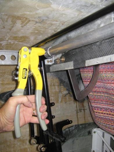 Riviting stops in place