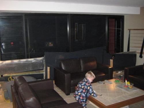 Grandson Cody sharing the living room with wings .....