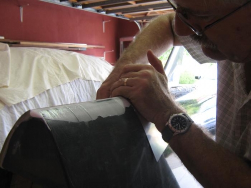 Using a piece of thin stainless to re-form the leading edge.