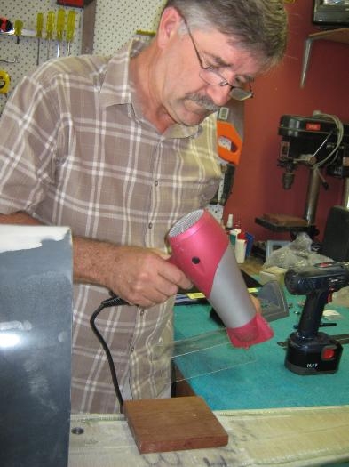 Heating the clear sheet