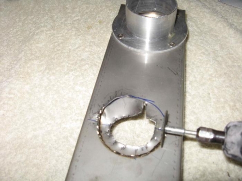 Cutting the hole for the carbi heat.