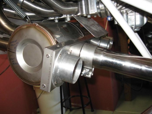 Muff fitted over the exhaust.