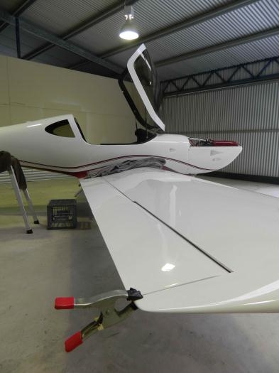 Aileron clamped in neutral position.