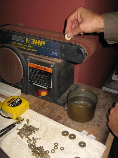 Grinding a flat on the large area washers