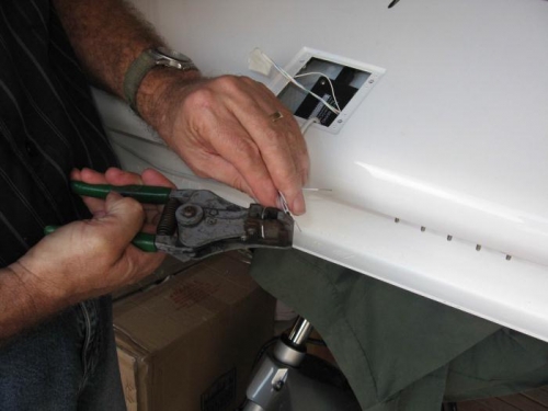 Wiring the elevator trim.