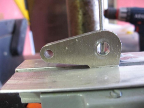 Relocating the air box locating pin.