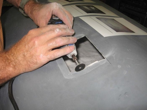 Trimming the cut-out to take the hinge.