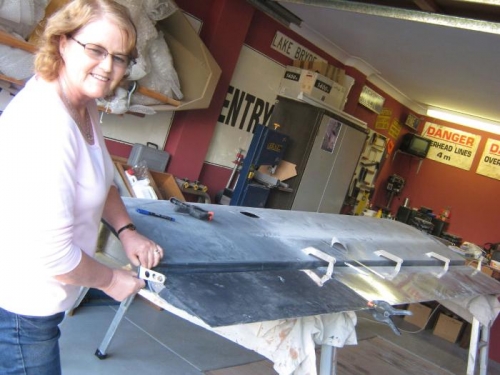 Sheryl helping align the aileron.