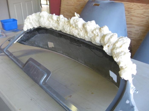 Expanding foam sprayed on.