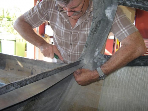 Fitting the seat back brace.