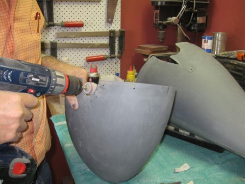 Final shaping and sanding of wheel pants.