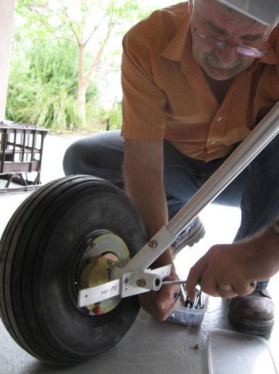 Removing pant brackets to attach nut-plates,