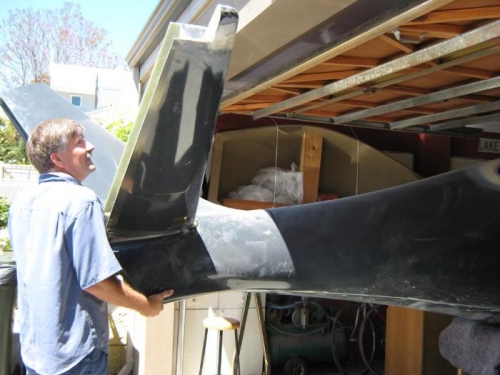 Take tail outside to get clearance to roll