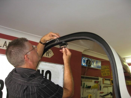 Preparing the latch assembly hole.