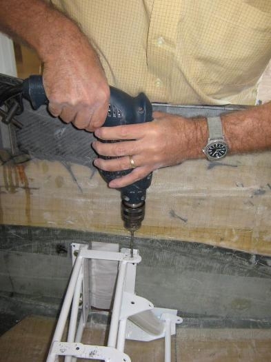 Drilling and bolting the top tangs  on the spar box.