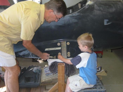 Apprentice Cody helping with bolt torquing