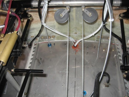 Inside the firewall ...... wiring and control cables well clear of the rudder cables.