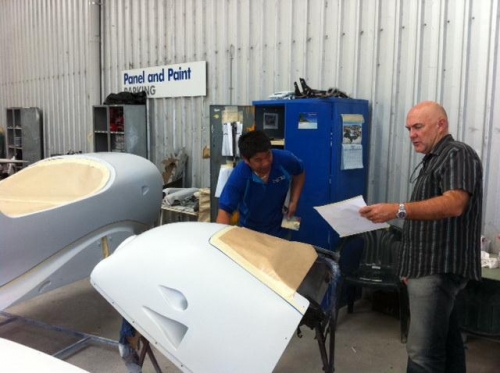 Adjusting the lower cowl lines.