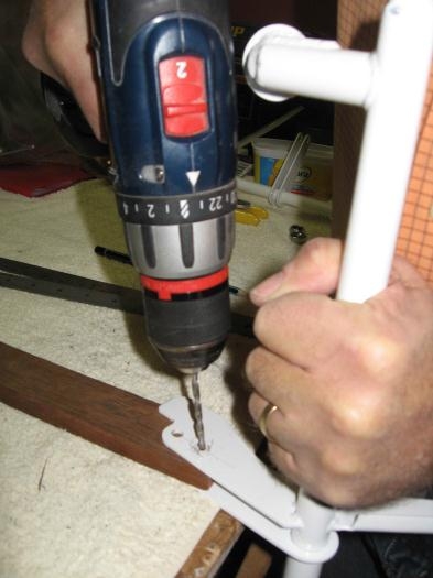 drilling the new hole (as per manual) in the mixer arm for the elevator push rod