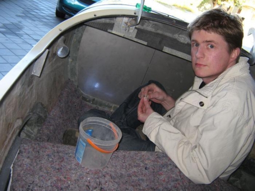 Robert helping to fit the nutplates for the lower cowl.