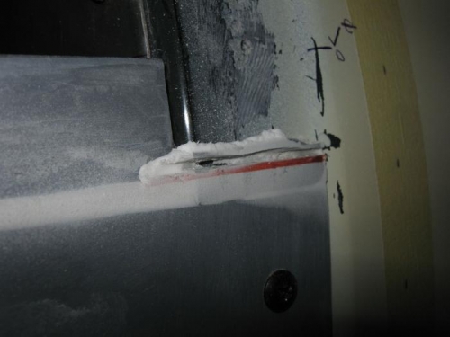 Trimming the glassed extension.