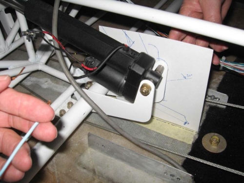 Adding power to the flap motor, and marking the position of the arm.