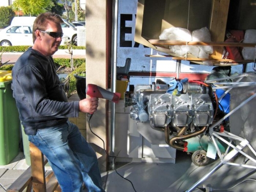 Dean relaxing - and heating the locktite 601 on the prop flange bolts.