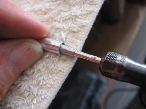 Reaming out the insert.