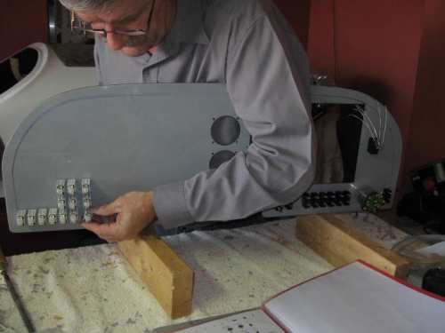 Fitting switches and circuit breakers.