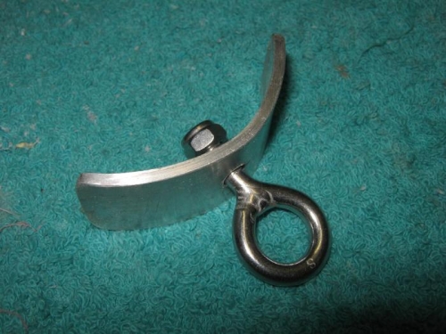 Tail tie-down eyebolt and backing plate