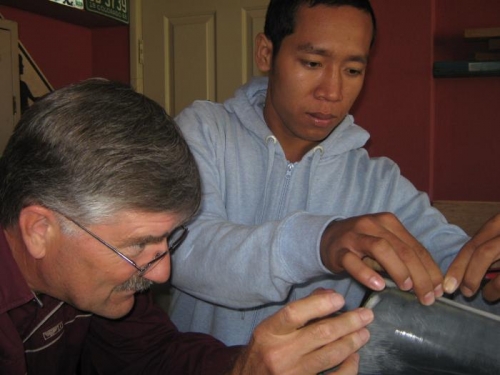 Ratana helping fit the tie-down eye bolt.