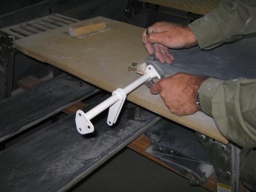 Removing elevator bracket.