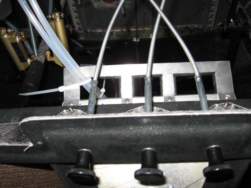 Bracket to guide/hold pipes & leads.