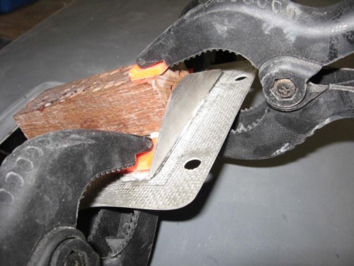 Fitting a stiffener inside the cover.