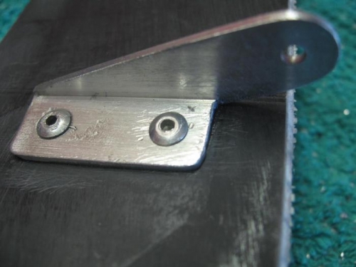 Horn riveted in place on trim tab