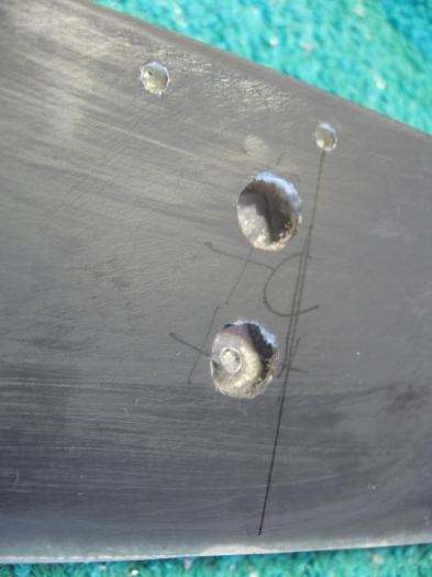 Access holes & SS plates inside tab