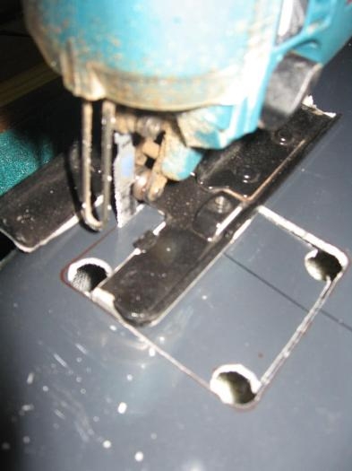 Cutting the access hole in the underside of the elevator